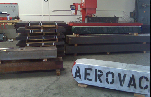 Aero-Vac Alloys & Forge metal processing facility with saw cutting equipment